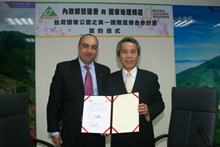 Director Li and Mr. Himatsinghani pictured together after signing.